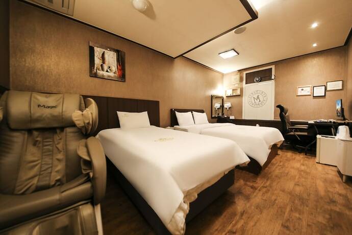 Imagen de la habitación del Hotel CoCo Hotel. Foto 9