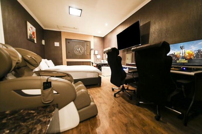 Imagen de la habitación del Hotel CoCo Hotel. Foto 13