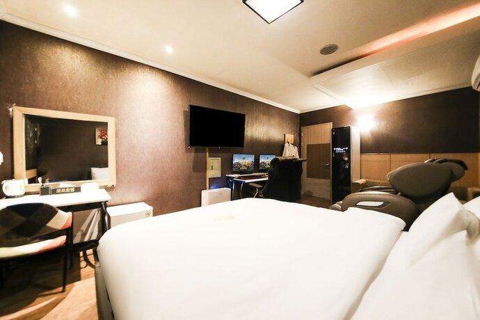 Imagen de la habitación del Hotel CoCo Hotel. Foto 15