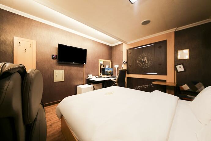 Imagen de la habitación del Hotel CoCo Hotel. Foto 16