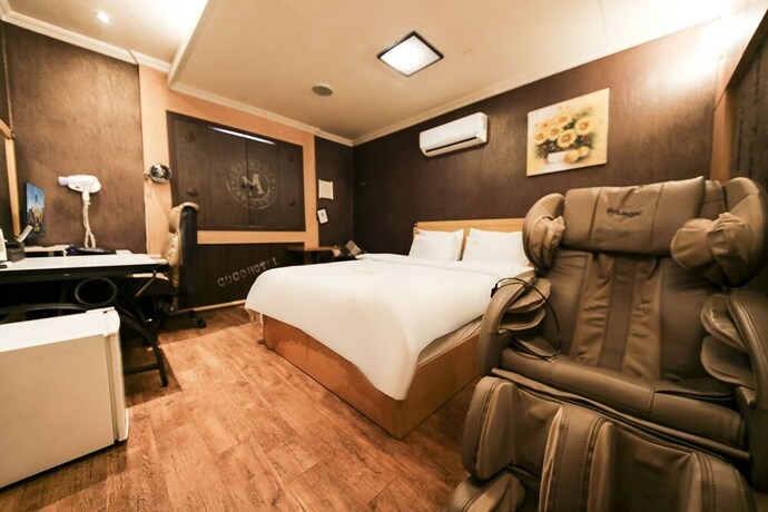 Imagen de la habitación del Hotel CoCo Hotel. Foto 17