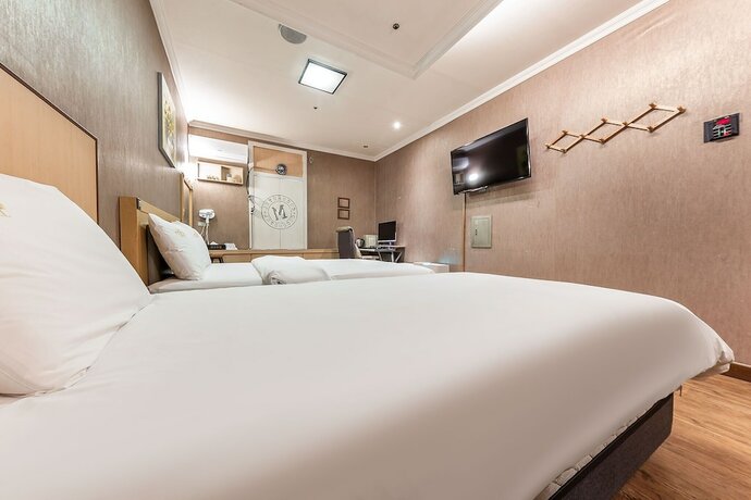 Imagen de la habitación del Hotel CoCo Hotel. Foto 18