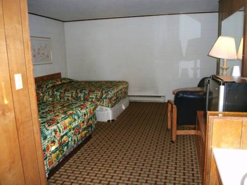 Imagen de la habitación del Hotel Coach N Four. Foto 3