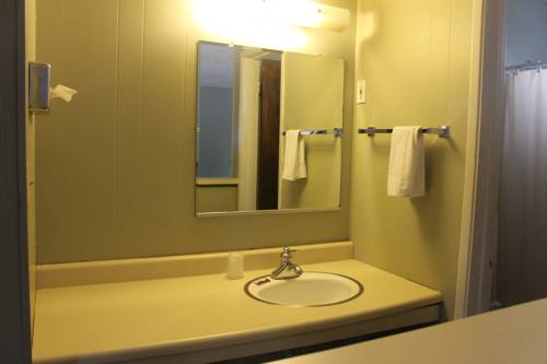 Imagen de la habitación del Hotel Coach N Four. Foto 5