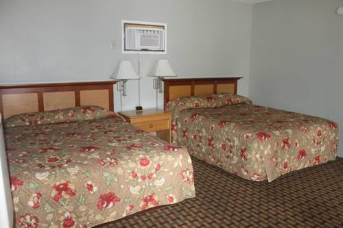 Imagen de la habitación del Hotel Coach N Four. Foto 6