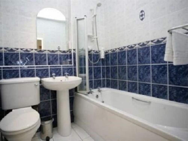 Imagen de la habitación del Hotel Coachman. Foto 17