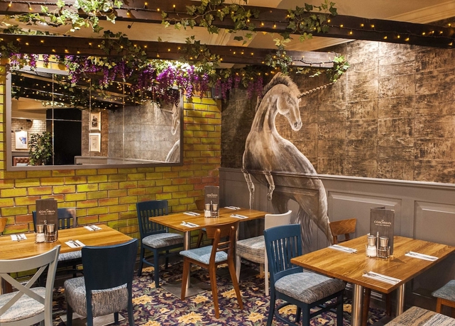 Imagen del bar/restaurante del Hotel Coachman. Foto 8