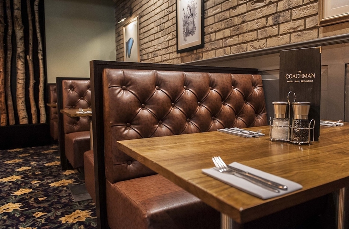 Imagen del bar/restaurante del Hotel Coachman. Foto 9