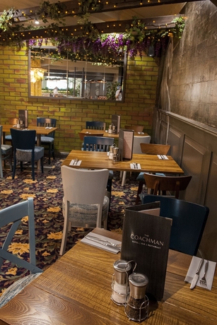 Imagen del bar/restaurante del Hotel Coachman. Foto 10