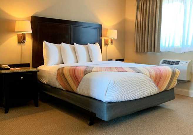 Imagen de la habitación del Hotel Coachman Inn And Suites. Foto 2