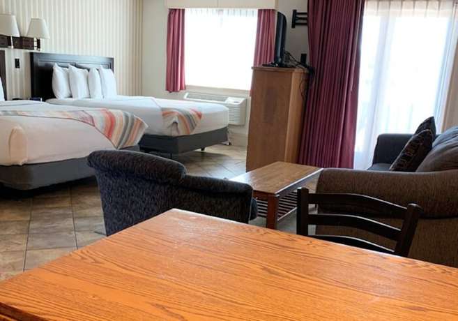 Imagen de la habitación del Hotel Coachman Inn And Suites. Foto 4