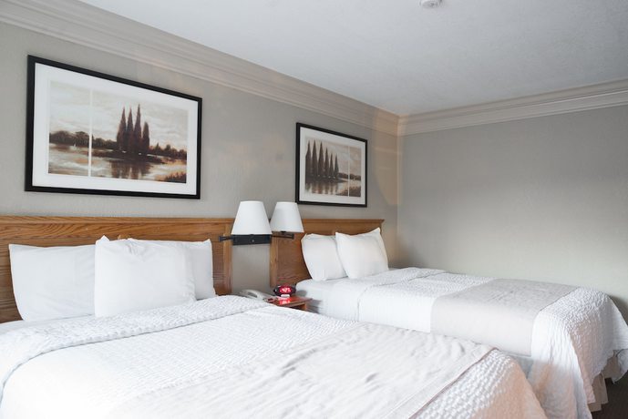 Imagen de la habitación del Hotel Coachman Inn And Suites. Foto 5