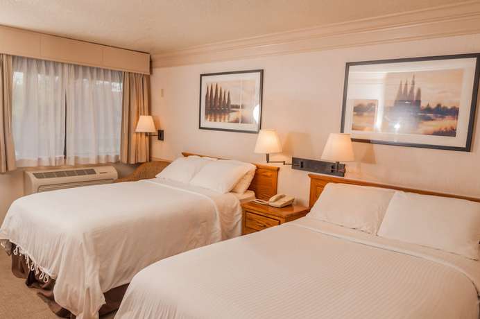 Imagen de la habitación del Hotel Coachman Inn And Suites. Foto 6