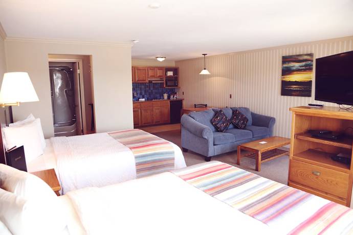 Imagen de la habitación del Hotel Coachman Inn And Suites. Foto 8