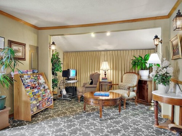 Imagen de los interiores del Hotel Coachman Inn And Suites. Foto 20