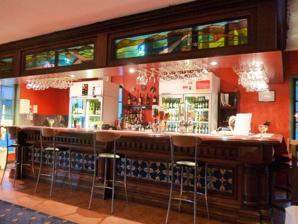 Imagen de la habitación del Hotel Coachman's Eden. Foto 4