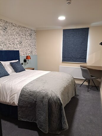 Imagen de la habitación del Hotel Coachmans Inn. Foto 20