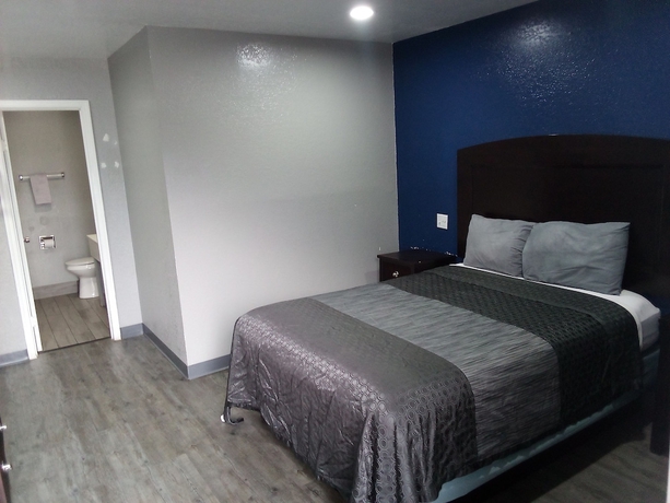 Imagen de la habitación del Hotel Coachman\'s Inn and Suites. Foto 2