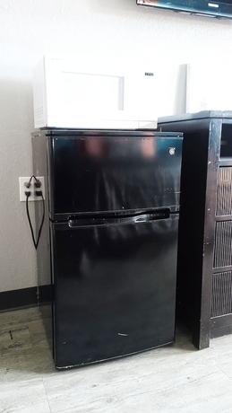 Imagen de la habitación del Hotel Coachman\'s Inn and Suites. Foto 3