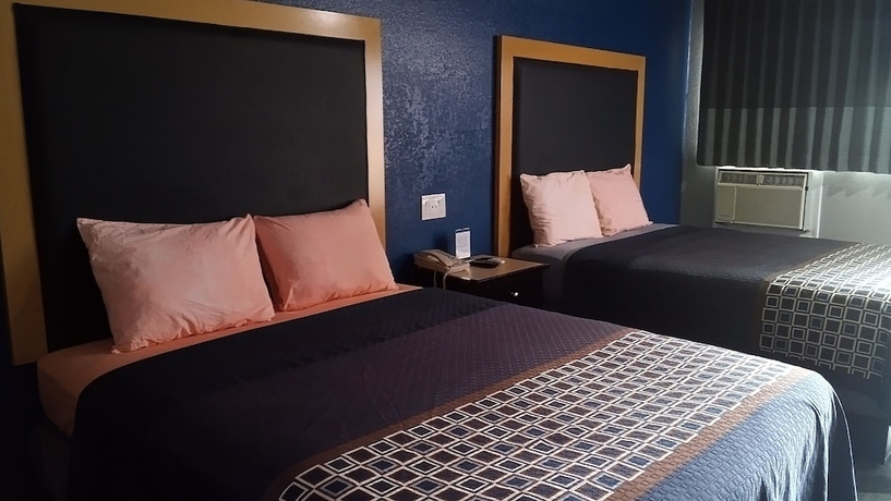 Imagen de la habitación del Hotel Coachman\'s Inn and Suites. Foto 4