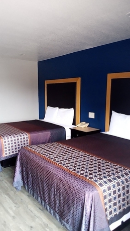 Imagen de la habitación del Hotel Coachman\'s Inn and Suites. Foto 5