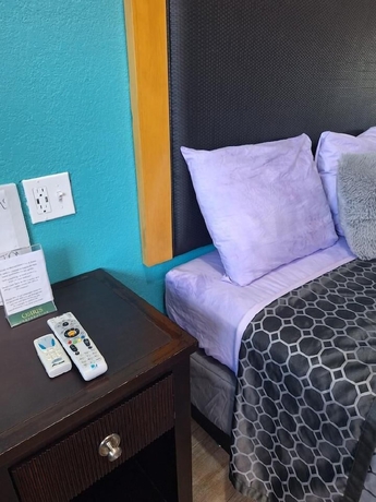 Imagen de la habitación del Hotel Coachman\'s Inn and Suites. Foto 6