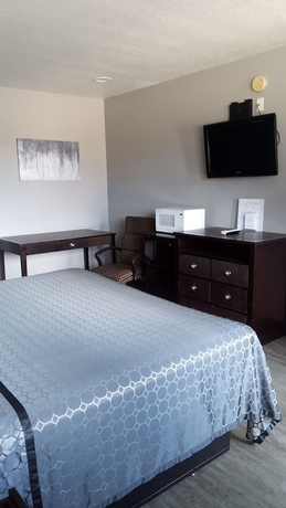 Imagen de la habitación del Hotel Coachman\'s Inn and Suites. Foto 7