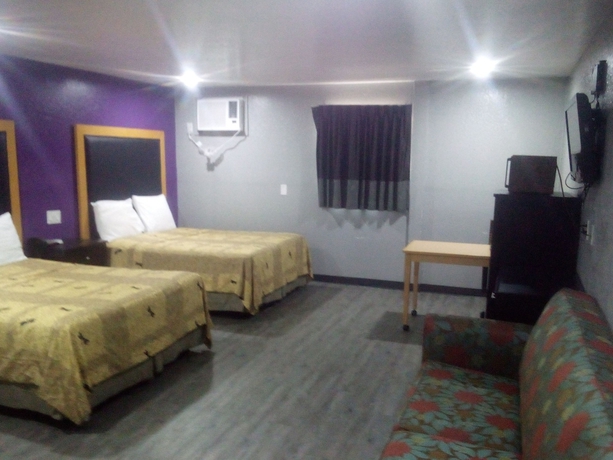 Imagen de la habitación del Hotel Coachman\'s Inn and Suites. Foto 8
