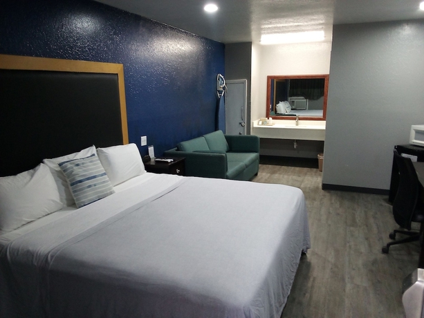 Imagen de la habitación del Hotel Coachman\'s Inn and Suites. Foto 9
