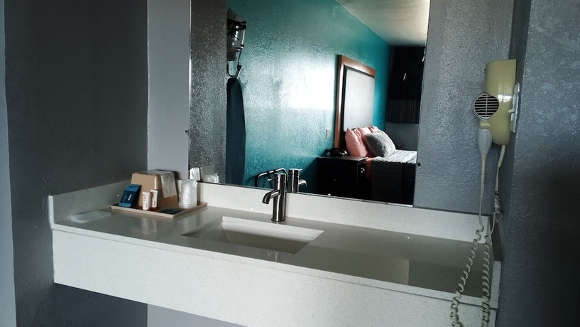 Imagen de la habitación del Hotel Coachman\'s Inn and Suites. Foto 10