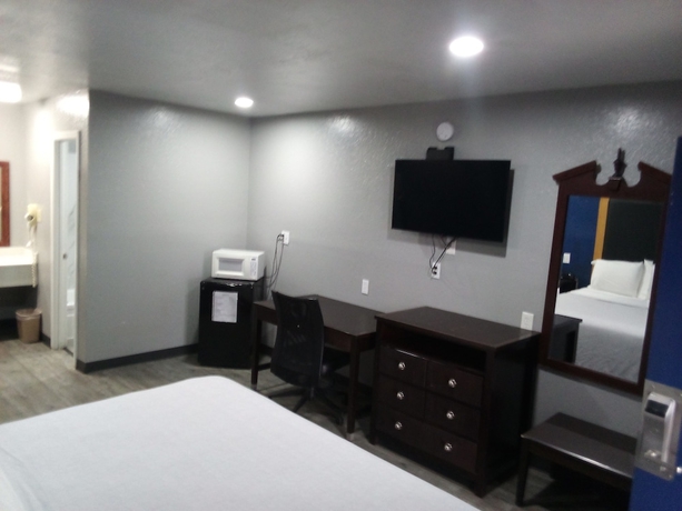 Imagen de la habitación del Hotel Coachman\'s Inn and Suites. Foto 12