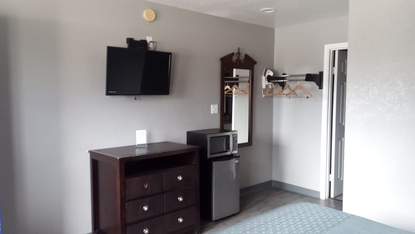 Imagen de la habitación del Hotel Coachman\'s Inn and Suites. Foto 14