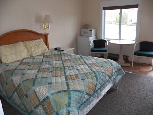 Imagen de la habitación del Hotel Coast Village Inn and Cottages. Foto 7