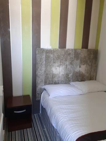 Imagen de la habitación del Hotel Coastal Bay. Foto 6