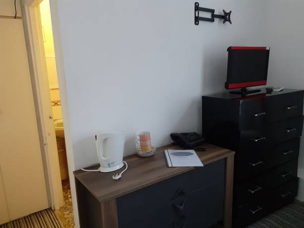Imagen de la habitación del Hotel Coastal Bay. Foto 8