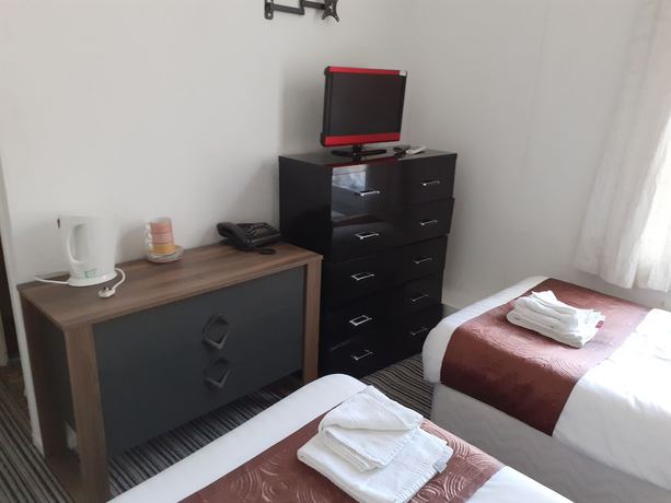 Imagen de la habitación del Hotel Coastal Bay. Foto 11