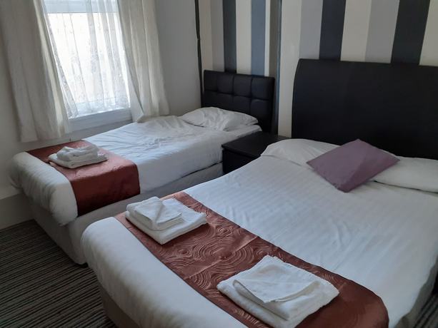 Imagen de la habitación del Hotel Coastal Bay. Foto 16