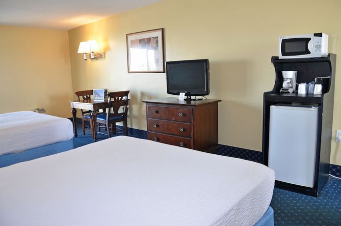 Imagen de la habitación del Hotel Coastal Palms Inn and Suites. Foto 2