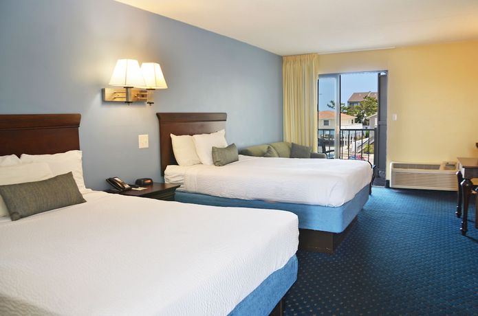 Imagen de la habitación del Hotel Coastal Palms Inn and Suites. Foto 3