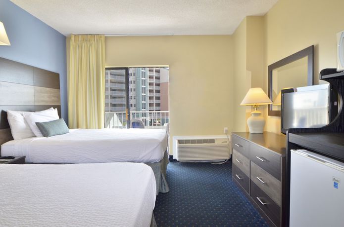 Imagen de la habitación del Hotel Coastal Palms Inn and Suites. Foto 5