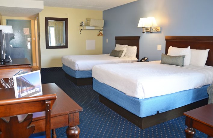 Imagen de la habitación del Hotel Coastal Palms Inn and Suites. Foto 12