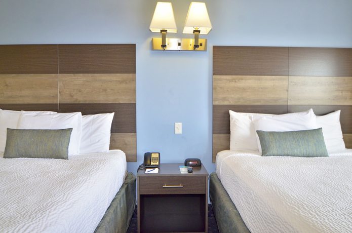 Imagen de la habitación del Hotel Coastal Palms Inn and Suites. Foto 14