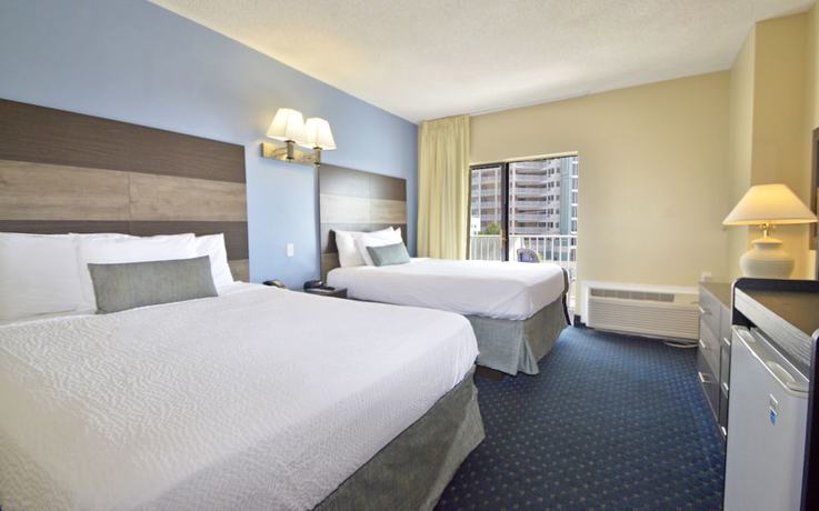 Imagen de la habitación del Hotel Coastal Palms Inn and Suites. Foto 16