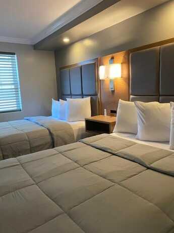 Imagen de la habitación del Hotel Coastal Sands Inn. Foto 11