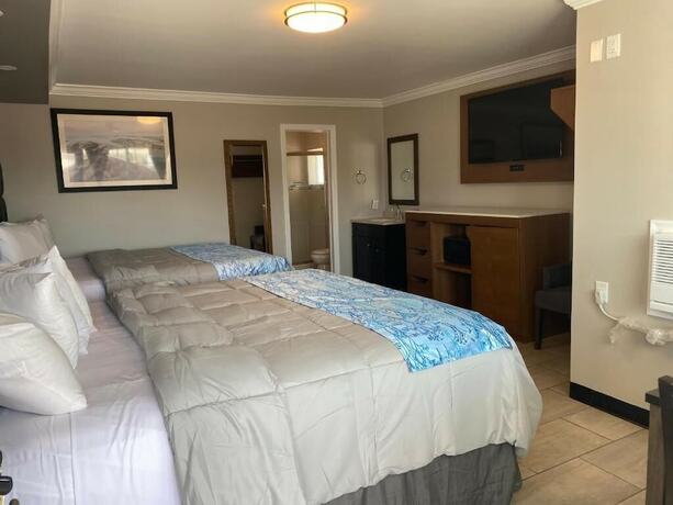 Imagen de la habitación del Hotel Coastal Sands Inn. Foto 13