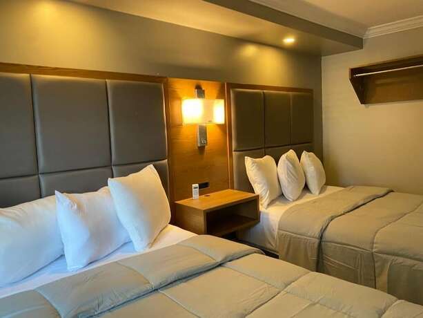 Imagen de la habitación del Hotel Coastal Sands Inn. Foto 16