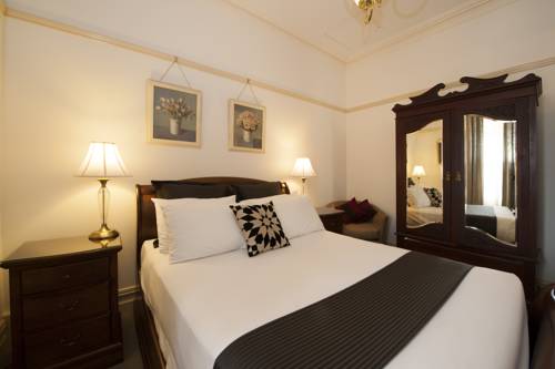 Imagen de la habitación del Hotel Cobb and Co Court Boutique. Foto 4