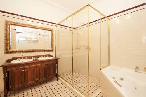 Imagen de la habitación del Hotel Cobb and Co Court Boutique. Foto 5