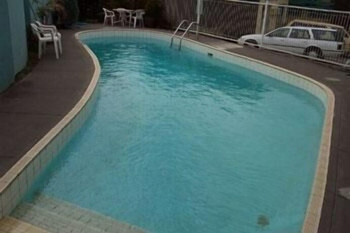 Imagen de la piscina del Hotel Coburg Motor Inn. Foto 12