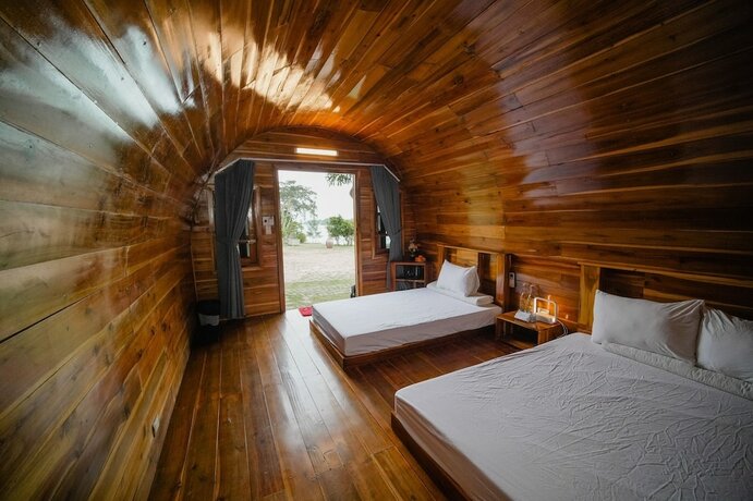 Imagen de la habitación del Hotel Cô Tô Village. Foto 16